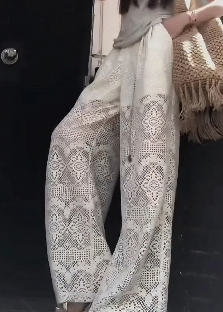 Französische weiße ausgehöhlte Taschen elastische Taille Spitzenhose Sommer AB1012