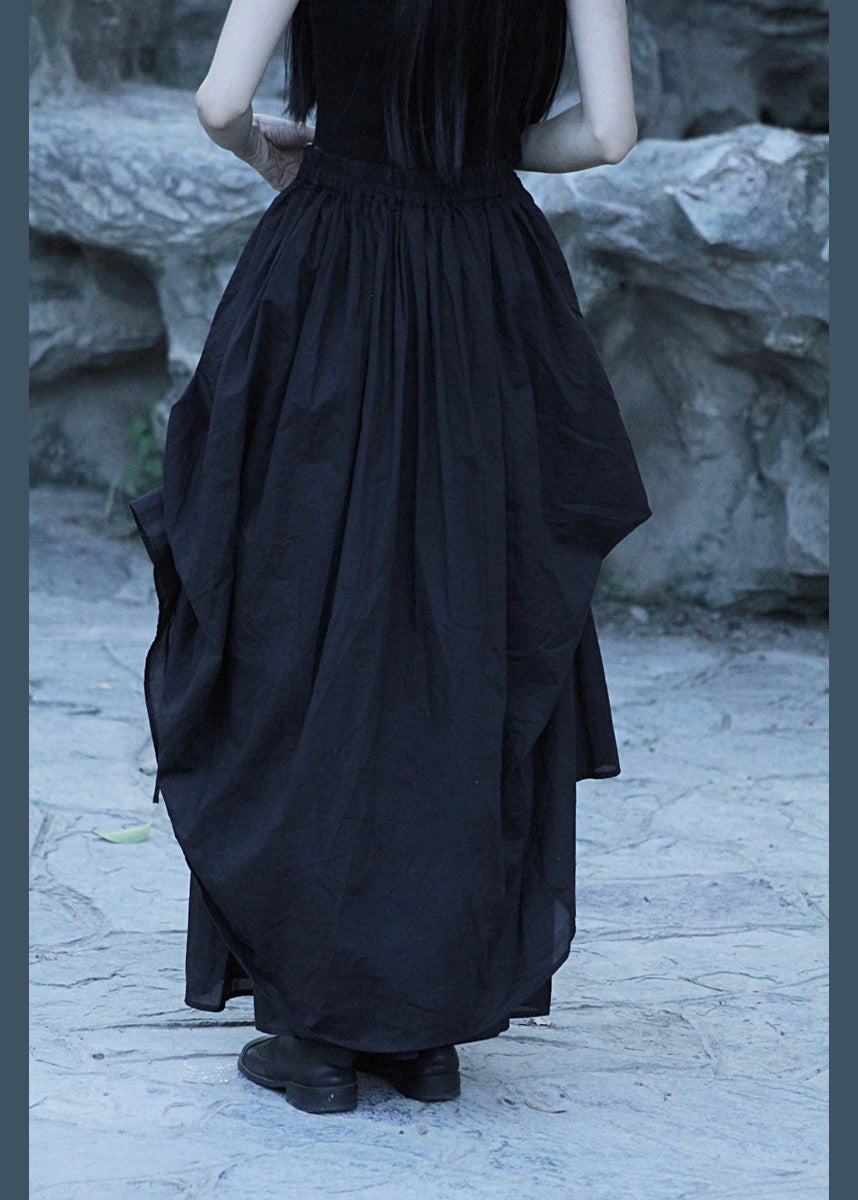 Lockerer schwarzer asymmetrischer faltiger Baumwollrock mit elastischer Taille für den Sommer LK005