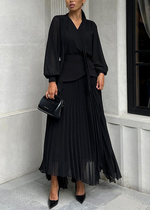 Neues schwarzes Top- und Faltenrock-Set mit asymmetrischem Design für Herbst QL023