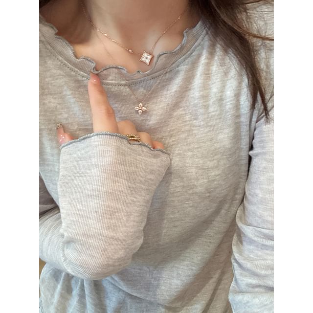 Sheer Tee with Round Neck, Long Sleeves, and Lettuce Edge Detail