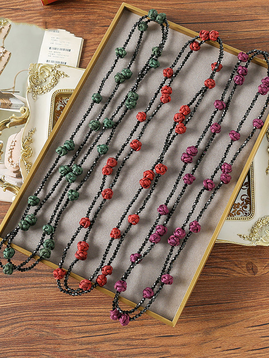 Collier pull tissé en perles à nœuds Ruyi pour femmes QN005 