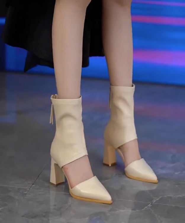 Bottes marron à talons épais et bout pointu avec empiècements creux XC1017