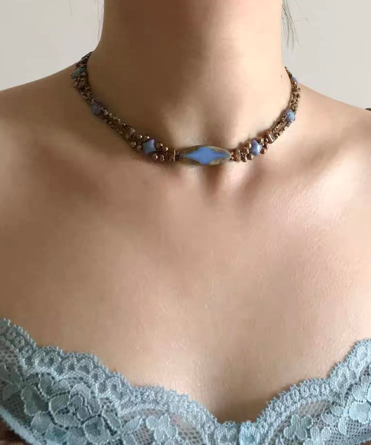 Collier de perles graduées en cuivre bleu fin surdoré QU015