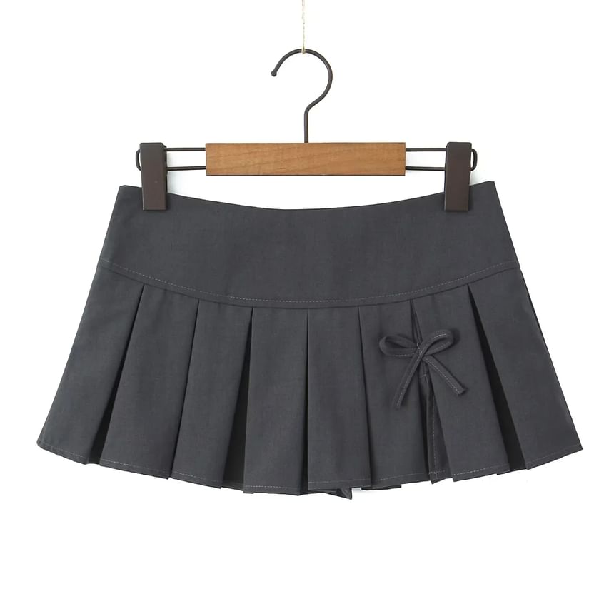 Low-Rise Bow Accent Pleated Slit Mini A-Line Skirt