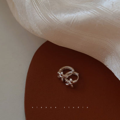 Silver Huggie Earring Bow Sterling