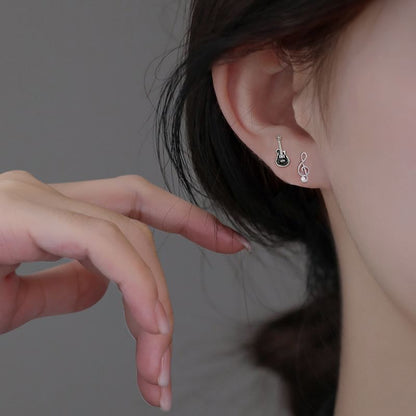 Asymmetrical Silver Sterling Stud Ear