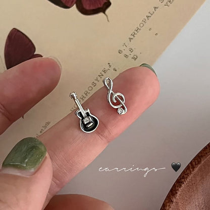 Asymmetrical Silver Sterling Stud Ear