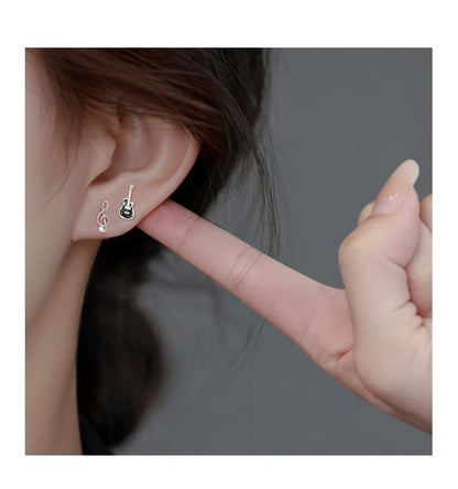 Asymmetrical Silver Sterling Stud Ear