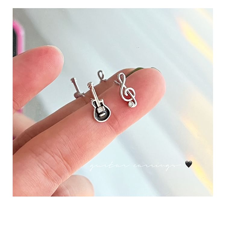 Asymmetrical Silver Sterling Stud Ear