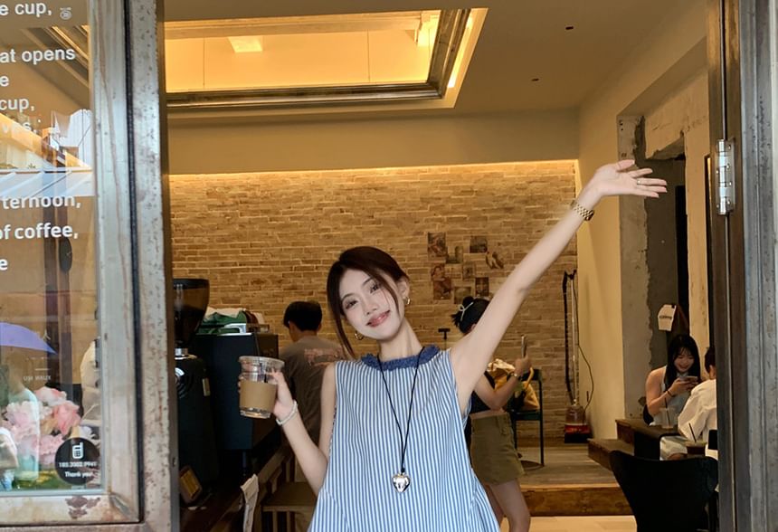 Striped Asymmetrical Sleeveless Blouse with Midi A-Line Skirt
