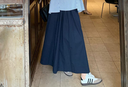 Striped Asymmetrical Sleeveless Blouse with Midi A-Line Skirt