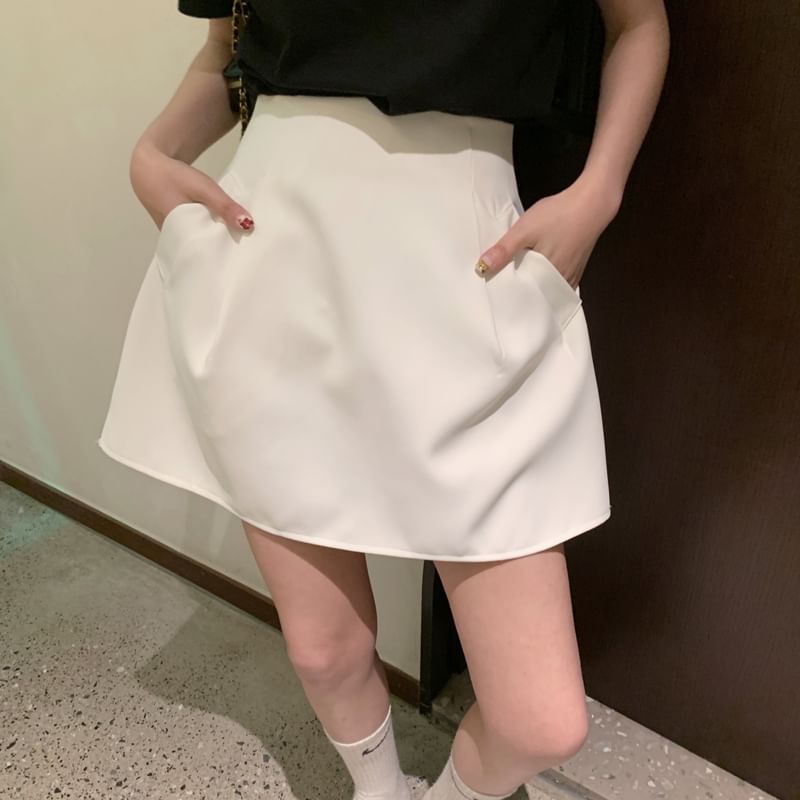 Plain High-Rise Flared Mini Skirt