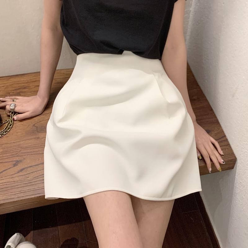 Plain High-Rise Flared Mini Skirt