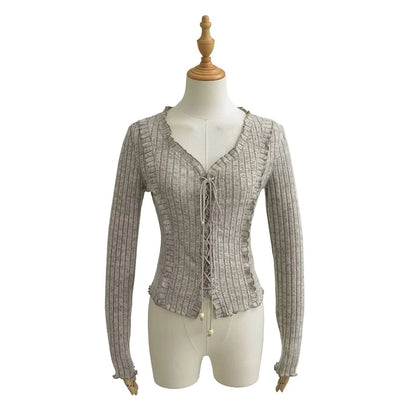 Ribbed V-Neck Lace-Up Cropped Knit with Ruffled Hem