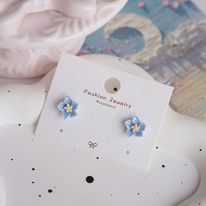 / Flower Clip Stud Earring On