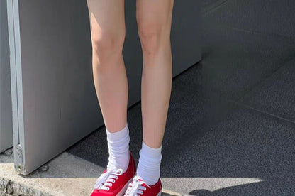 Bubble Hem Mini Skirt with Drawstring Waist in Solid