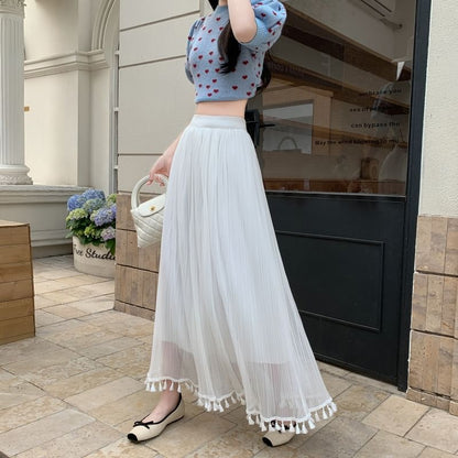 Tasseled High Rise Maxi Fishtail Skirt