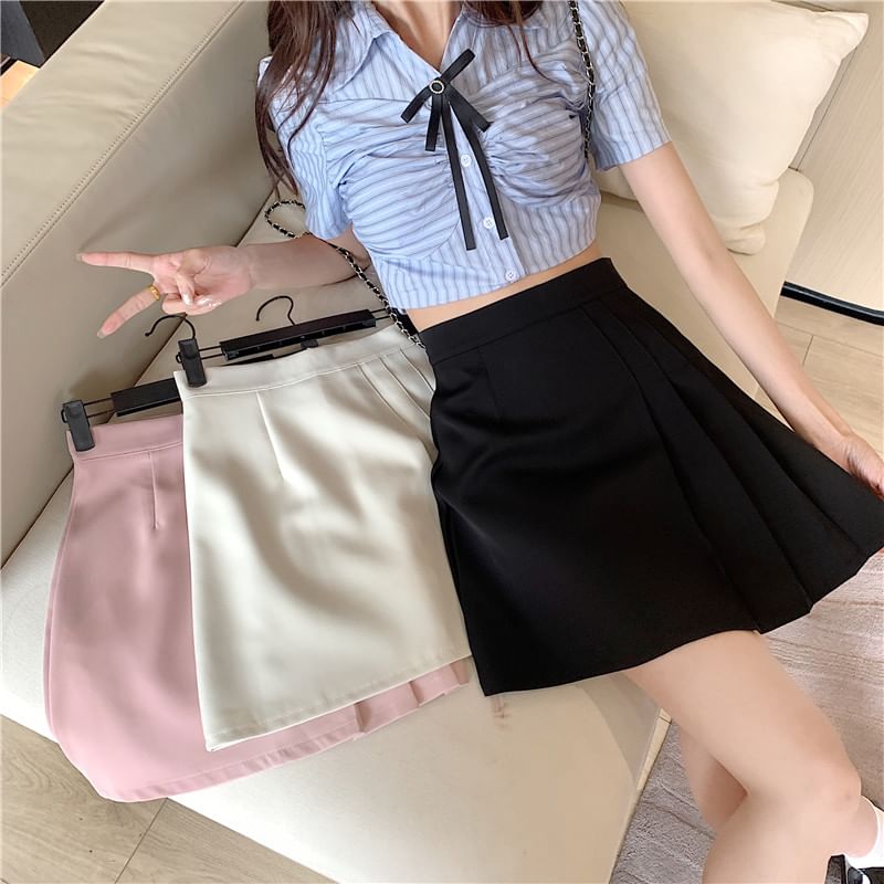 Pleated Asymmetrical Mini Skirt with Solid Fabric