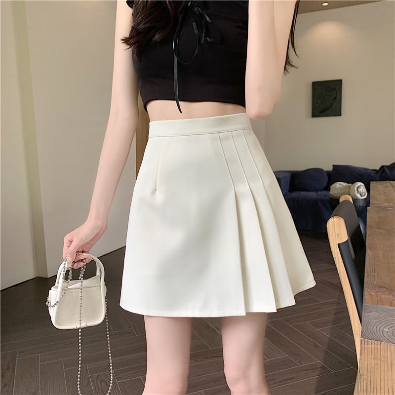 Pleated Asymmetrical Mini Skirt with Solid Fabric