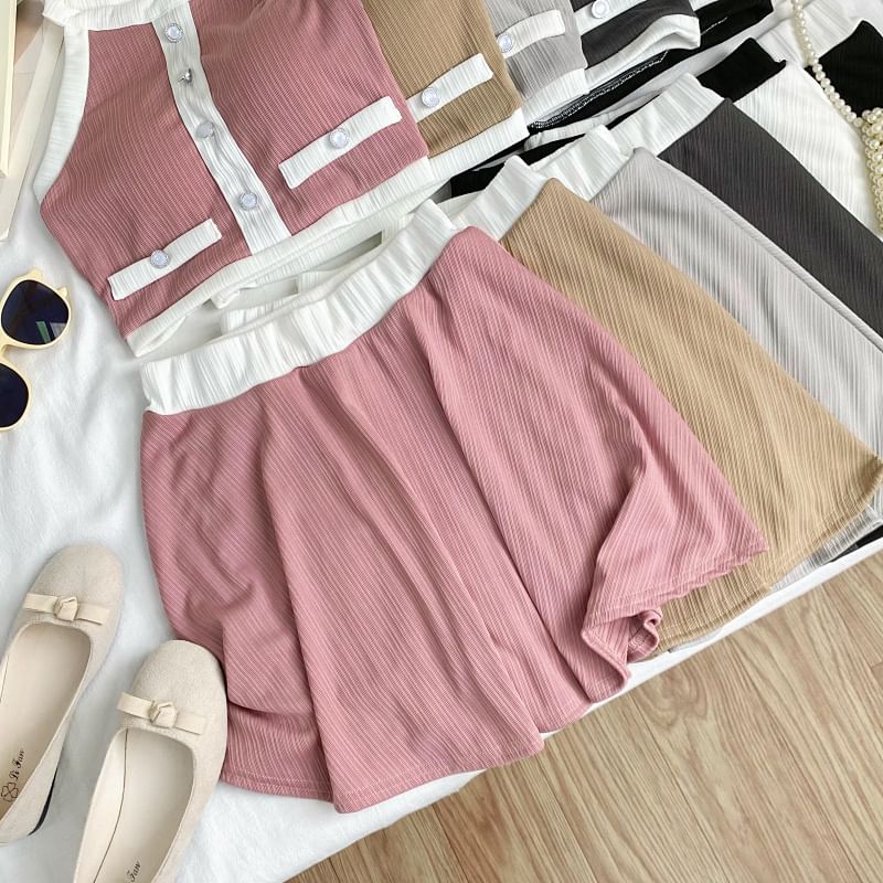 Two-Tone Sleeveless Crop Top Paired with A-Line Mini Skirt