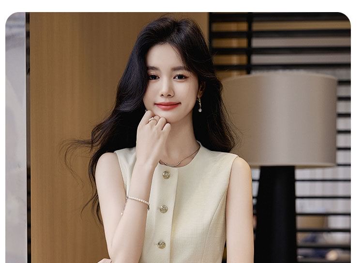 Sleeveless Vest and Pleated Mini Skirt Set