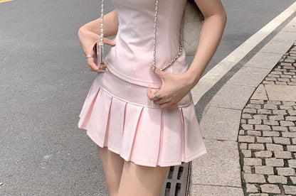 Polo Shirt & Pleated Mini Skirt