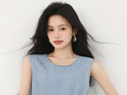 Denim Ruffle-Trimmed Asymmetric Round-Neck Tank Top