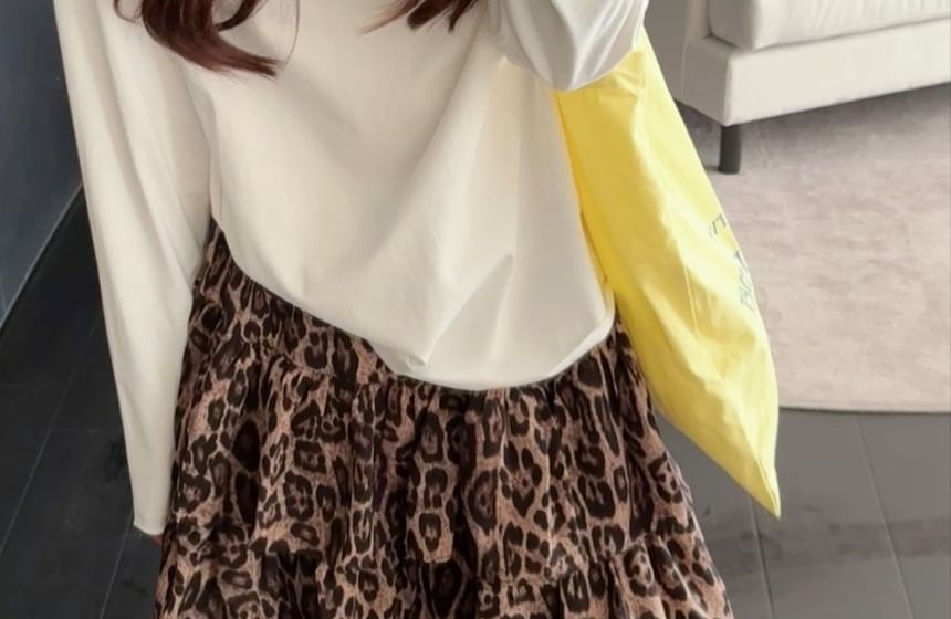 Round Neck Button Tee & Leopard Print Ruffle Mini Skirt