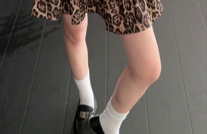 Round Neck Button Tee & Leopard Print Ruffle Mini Skirt