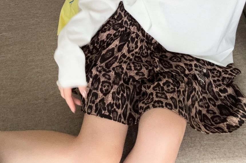 Round Neck Button Tee & Leopard Print Ruffle Mini Skirt