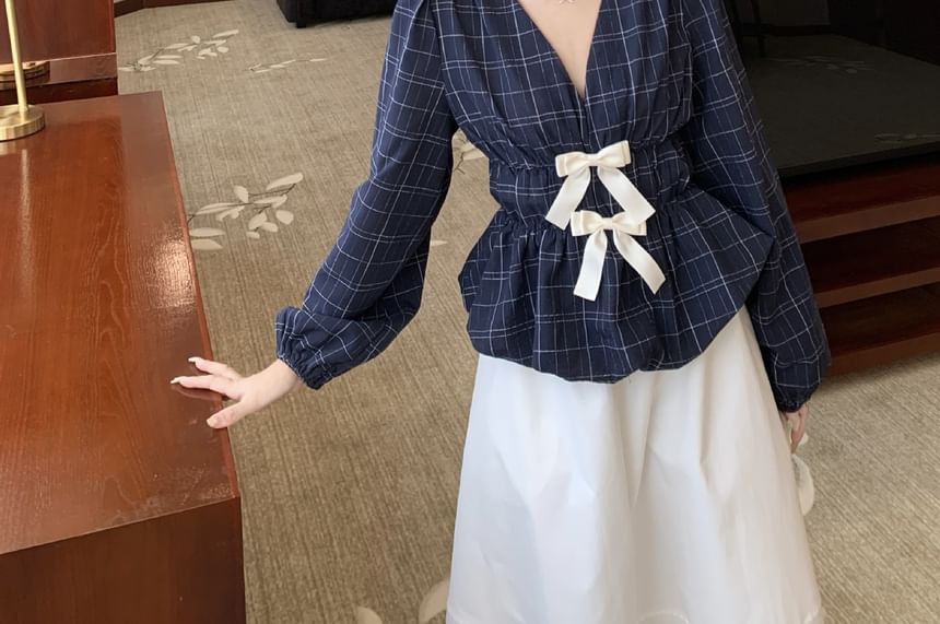 Peplum Blouse with Plaid Pattern and Bow Accent at V-Neck