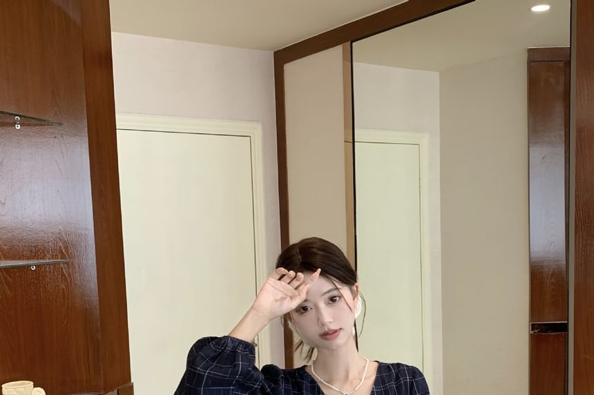 Peplum Blouse with Plaid Pattern and Bow Accent at V-Neck