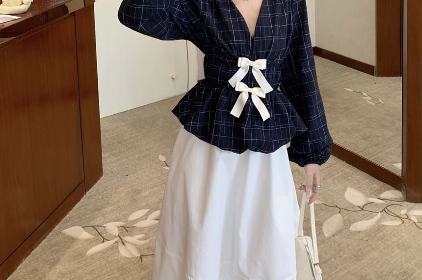 Peplum Blouse with Plaid Pattern and Bow Accent at V-Neck