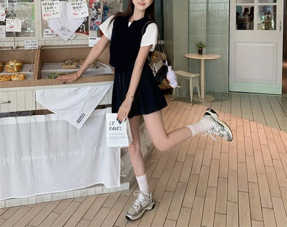 Mock Two-Piece Polo Top with Short Sleeves and Mini Pleated Skirt