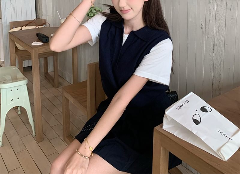Mock Two-Piece Polo Top with Short Sleeves and Mini Pleated Skirt