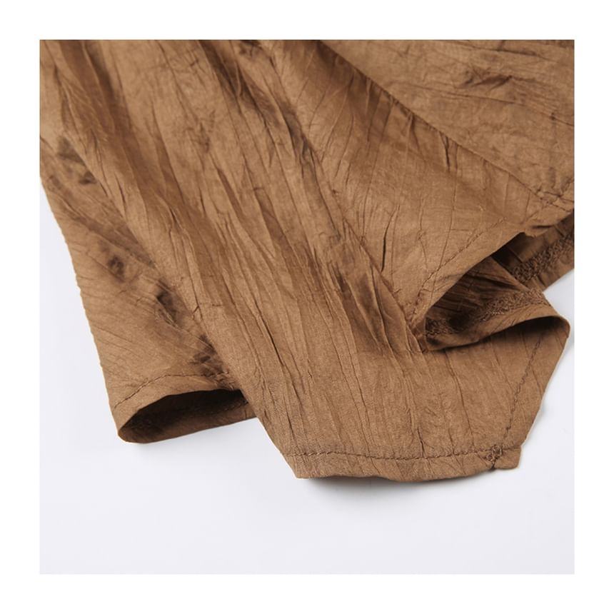 Low Rise Asymmetrical Grommet Fringed Mini A-Line Skirt