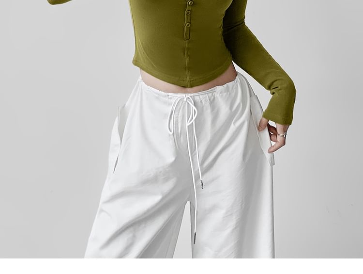 Two-Tone Cropped T-Shirt with Half Buttons and Faux-Layer Scoop Neck