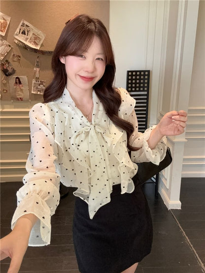 Dotted Ruffled Blouse with Puffed Sleeves and Neck Tie Detail
