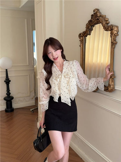 Dotted Ruffled Blouse with Puffed Sleeves and Neck Tie Detail
