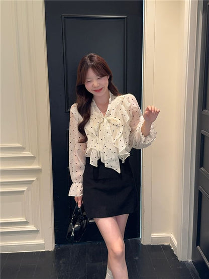Dotted Ruffled Blouse with Puffed Sleeves and Neck Tie Detail