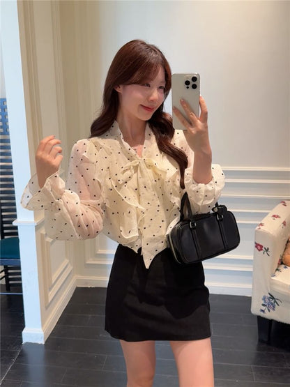 Dotted Ruffled Blouse with Puffed Sleeves and Neck Tie Detail