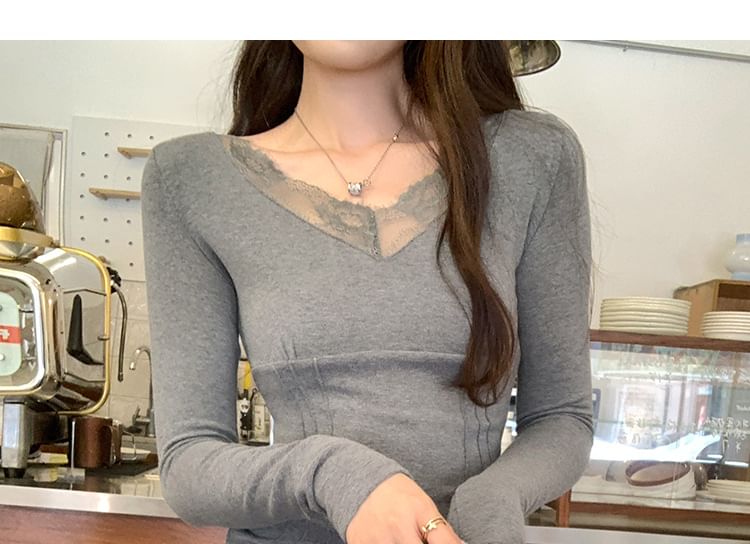 V-Neck Top with Lace Trim and Long Sleeves in Solid Color