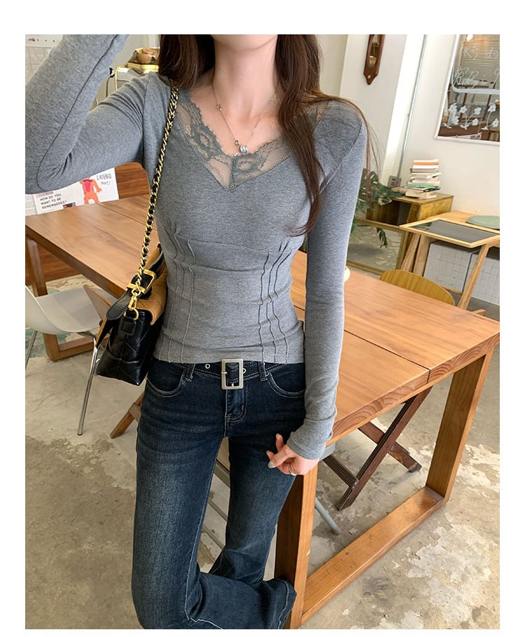 V-Neck Top with Lace Trim and Long Sleeves in Solid Color