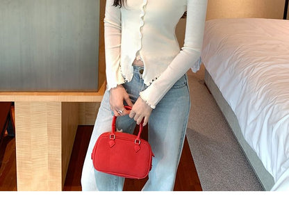 Faux-Layer Knit Top with Long Sleeves in Solid Color