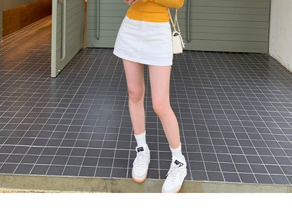 V-Neck Knit Top with Long Sleeves in Solid Color