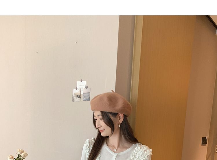 Button-Up Knit Top with Frill Trim and Long Sleeves in Solid Color
