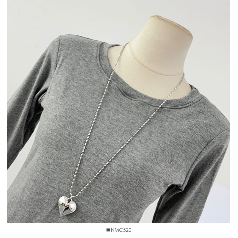 Color-Block Crew Neck Fitted Top with Ruffled Hem
