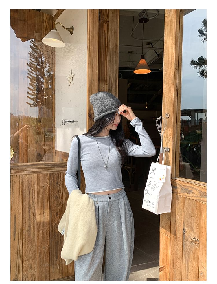 Two-Piece Style Cropped Knit Top with Round Neck and Long Sleeves