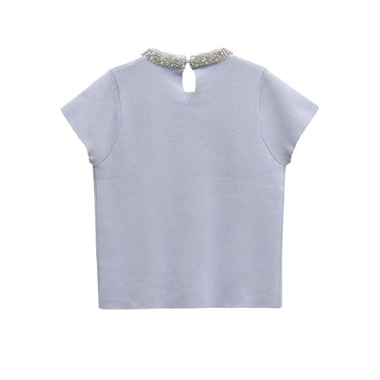 Short Sleeve Crew Neck Embellished Knit Top & High Waist Pleated Mini Skirt