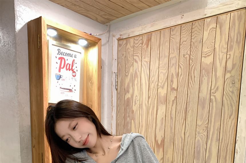 Hooded Half-Button Long-Sleeve Top